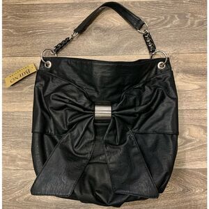 Bueno NWT handbag large bow detail on front chain strap. Faux leather